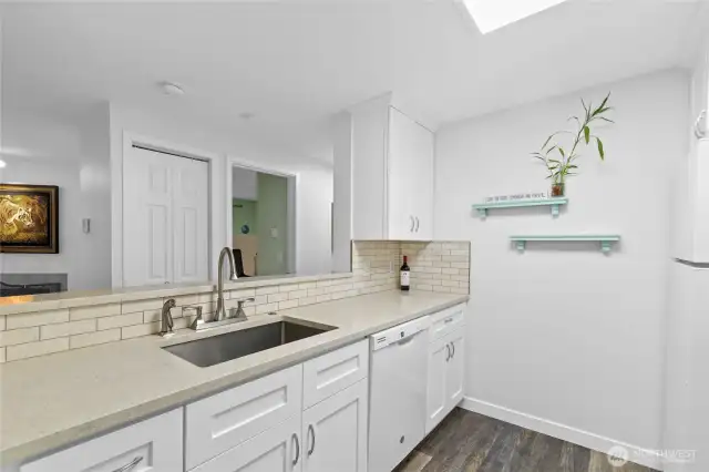 Chef’s dream kitchen! Modern updates, open to the dining & living areas, and perfect for entertaining!