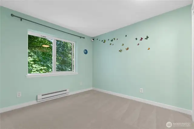 Enjoy added privacy, abundant natural light, and serene views of the lush greenbelt — the perfect condo retreat!