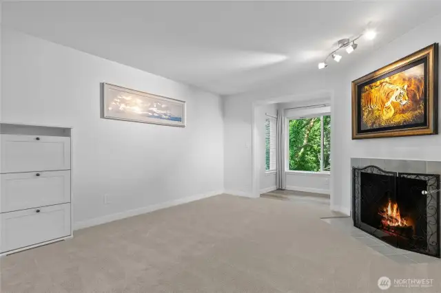 Unwind by the crackling fireplace under vaulted ceilings filled with natural light—your peaceful escape awaits.