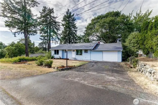 Attached garage, driveway and off-street parking.