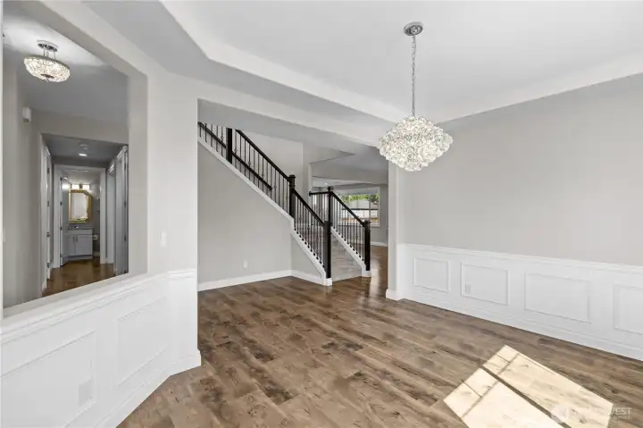 The Oversized Entryway Welcomes You to This Beautiful Home. High Ceilings and Doorways, Spacious Closets and Upgraded Lighting Throughout.