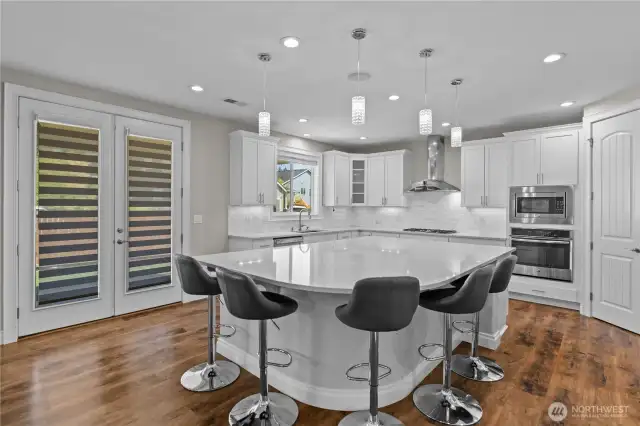 Host All of the Family and Friends Get-Togethers in this Spacious Chef's Kitchen. The Extra-Large Kitchen Island is Amazing! Additional Cabinets for All Your Party Favors on Two Sides.