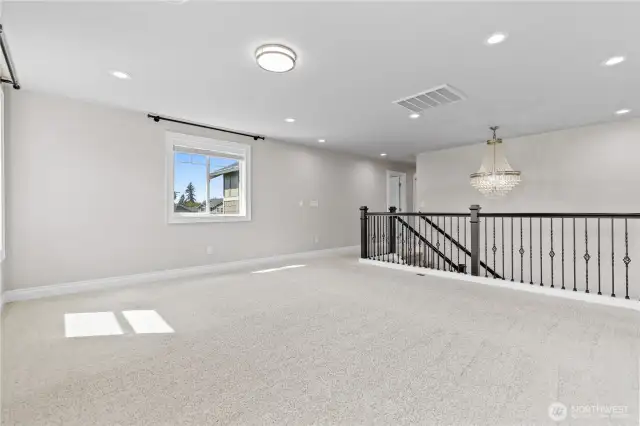 Super-Sized, Versatile Family Room Provides Ample Space for Entertainment or Relaxation.