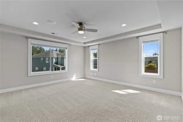 Primary Suite Features Coved Ceiling, Fan-Light and Abundant Room to Relax and Sleep Well.