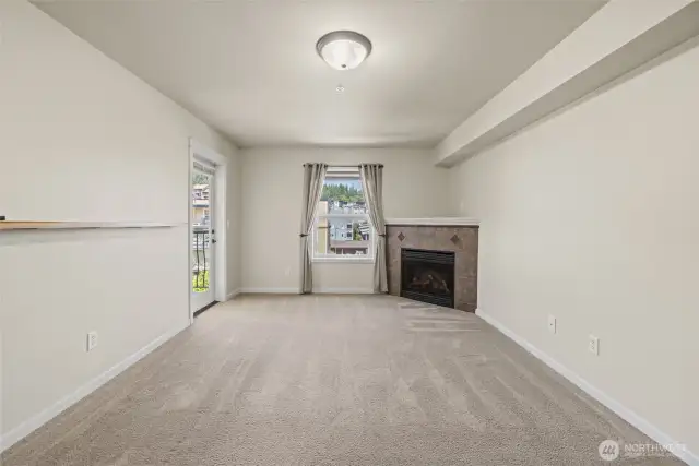 Living room with balcony door to the left
