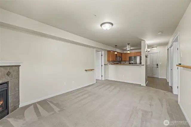 From the balcony door looking toward the kitchen and entry