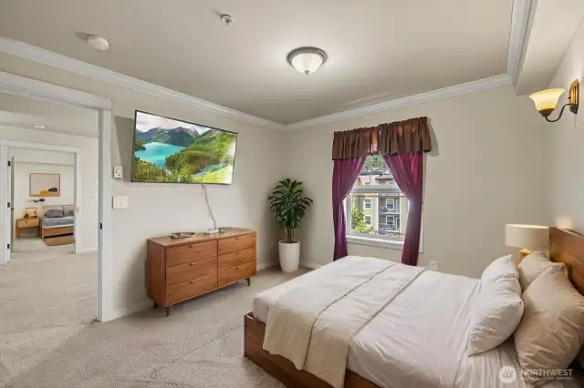Additional view of primary bedroom with virtual staging