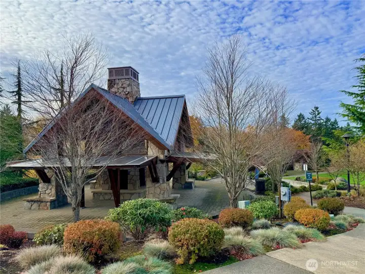 The community offers playgrounds and lawn areas for residents.