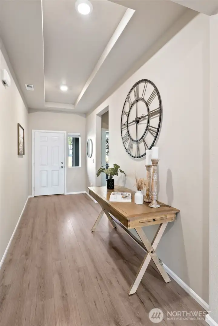 Expansive hallway entry with room for storage or a desk