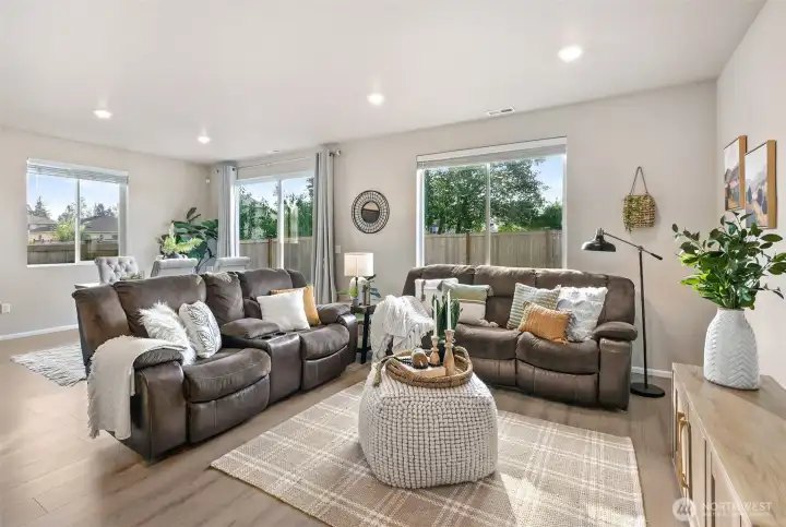 Open concept living and dining area with lots of natural light