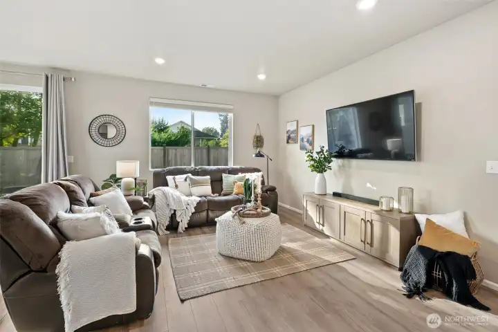 Open concept living and dining area with lots of natural light