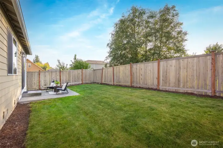 Spacious fenced backyard