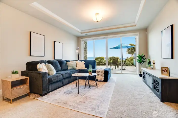 With flexibility in mind, this area offers the opportunity to create an additional bedroom—featuring its own wall of glass to the patio and transom windows that maintain natural light and flow into the family room.