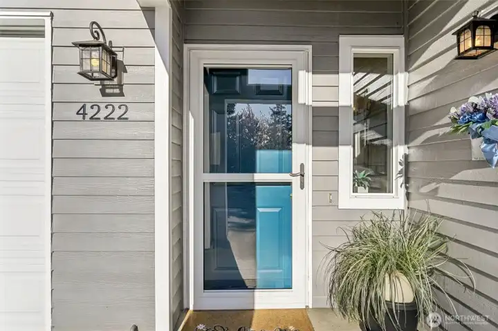 Welcoming front door - building recently re-sided and painted!