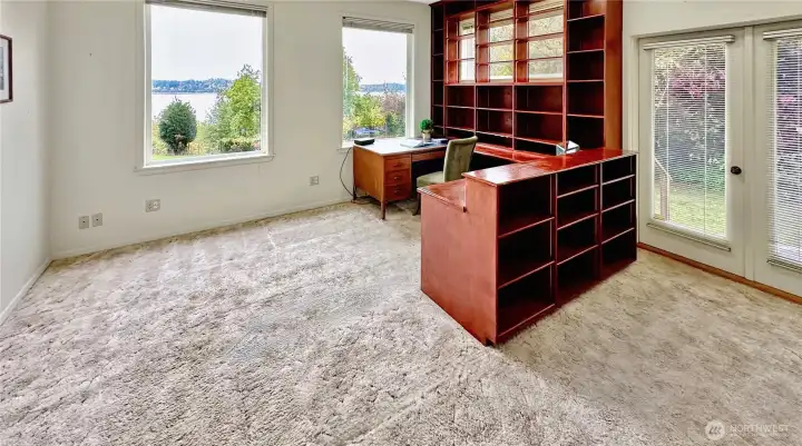 4403...Private Library with built-ins and French doors to the side deck.