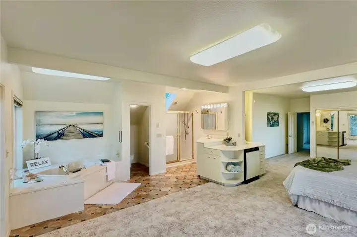 4403...Primary bath with soaking tub, sky lighted shower stall and double vanities.