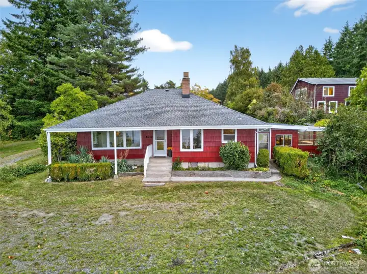 4407...Charming, private 2nd home with 2 bedrooms, 1.5 baths, breezeway with adjoining greenhouse.