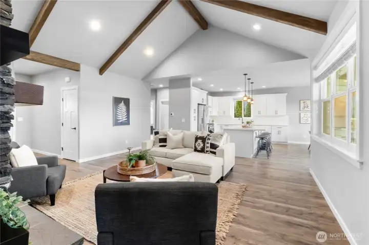 Home features high-end wood laminate flooring, A/C, PlyGem windows and window blinds