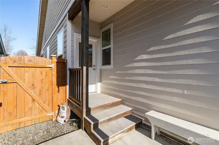 Back patio with entrance to living room,