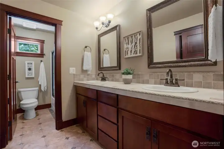 Main House - upstairs - bathroom with double sink/shower/bathtub
