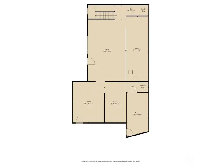 Lowest Level with tall ceilings and garage door that opens to the bulkhead.