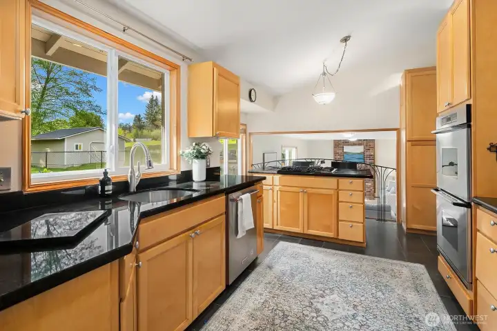Kitchen with counter eating space.