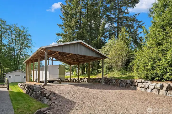 Huge covered carport to fit all your toys!