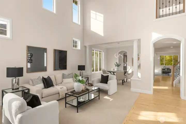 Step into soaring 18 ft ceilings foyer living room.