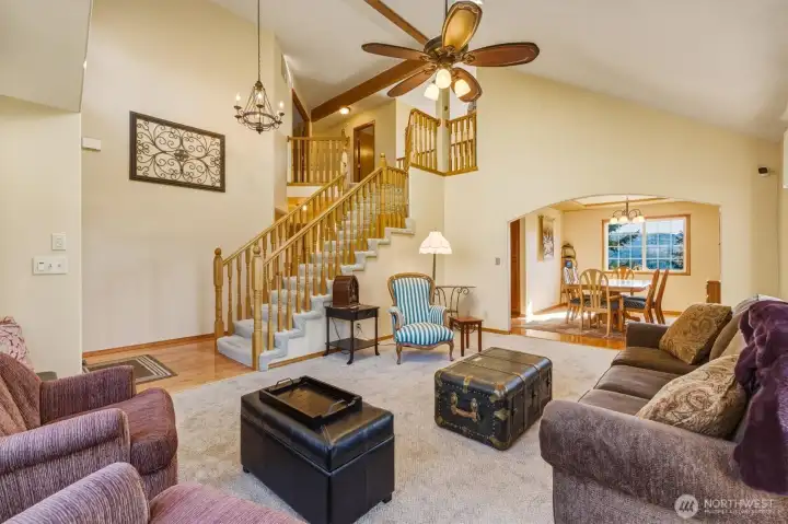 Living room with staircase.