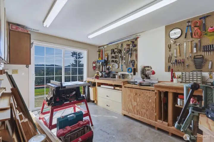 Workshop with slider out to the patio.