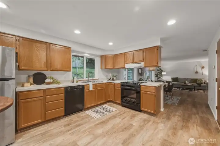 Kitchen is open and functional. Great views into private back yard.