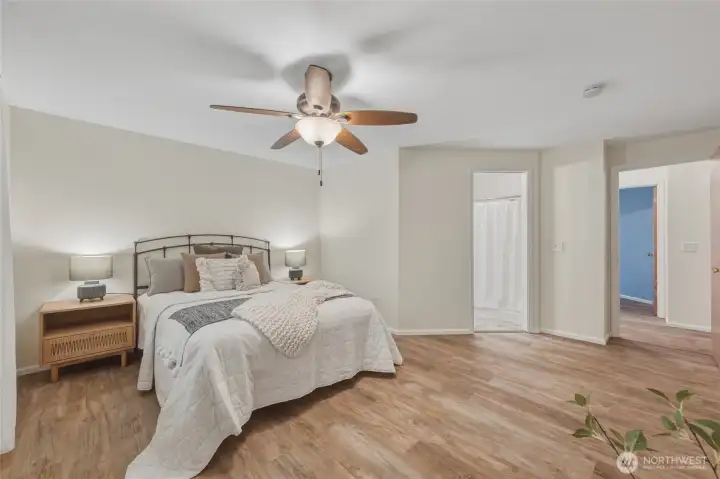 Primary bedroom.  Door leads to ensuite bath and walk in closet.