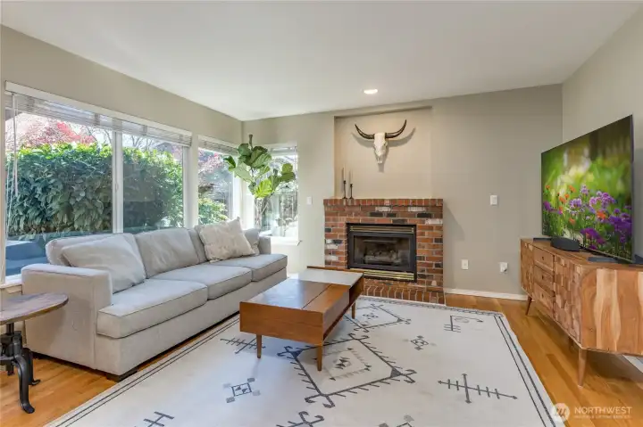 Family room features a cozy gas fireplace