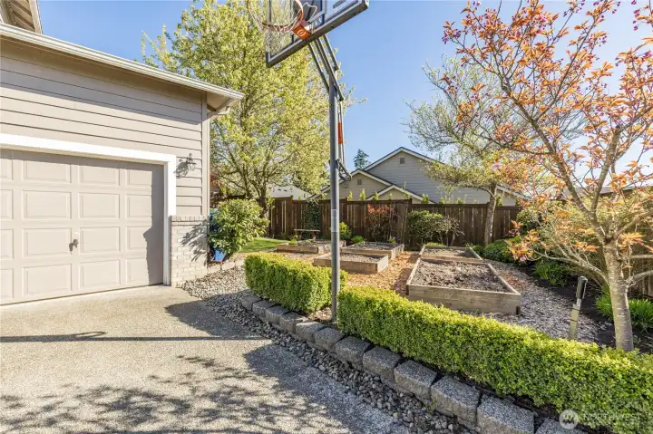 Attached 3-car garage and expansive driveway