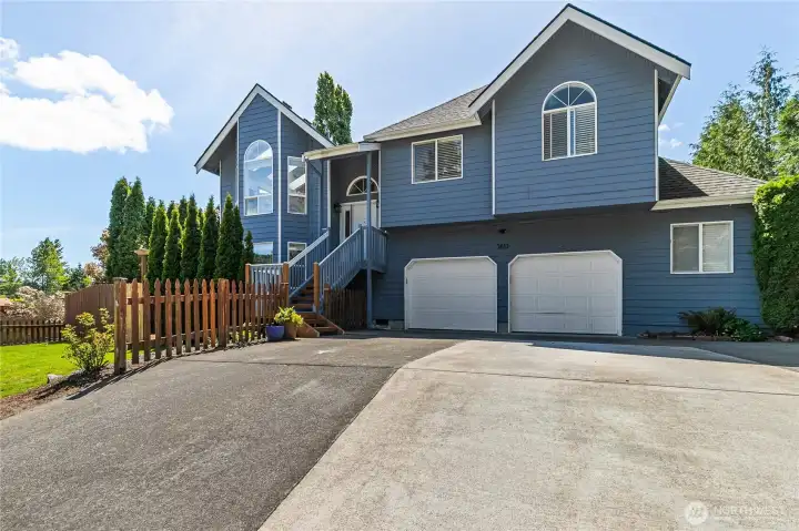 2 car garage with a large driveway and lots of parking. 2 car garage with a large driveway and lots of parking.