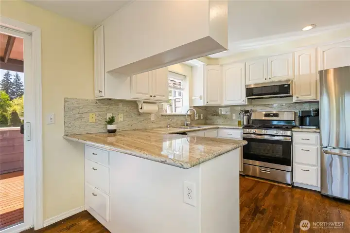 Granite counter tops with stainless steel appliances. Granite counter tops with stainless steel appliances.