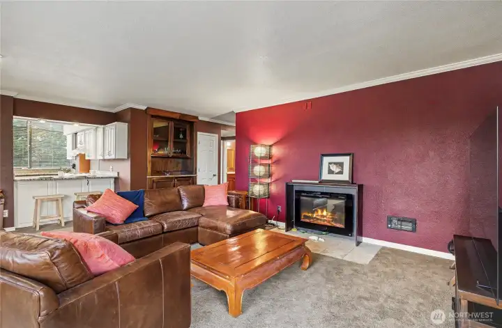 View from your living room toward your kitchen. You will love the modern look and feel throughout this condo.