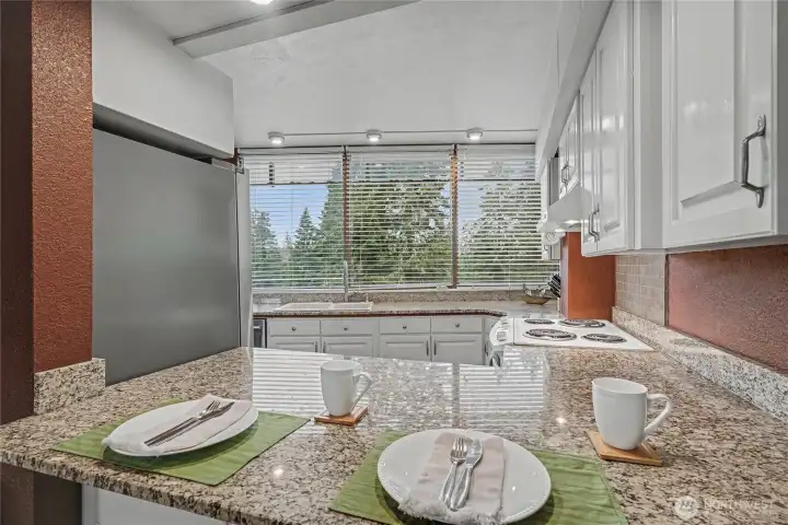 View into your kitchen from the kitchen counter, nice granite countertops!