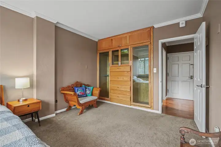 Bedroom #1, I really love the wood built-in closets in this unit.