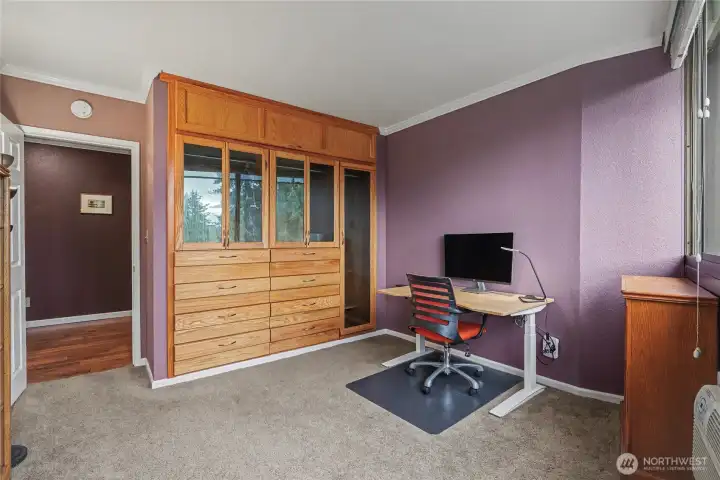 Bedroom #2, currently used as a home office. Again, tremendous wood built-ins for your closet, elegant!