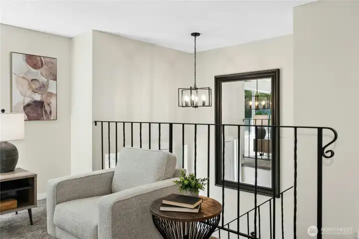 Split level foyer with new lighting.  Mirror included in home sale.
