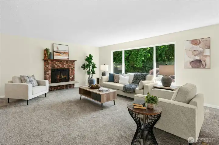 Spacious living area. Wood burning fireplace. Spacious living area. Wood burning fireplace.