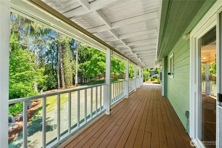 View of back deck/porch from sliding doors of primary bedroom