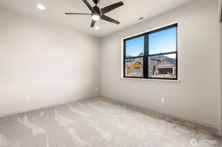 Spacious bedrooms with large closets and natural lighting.