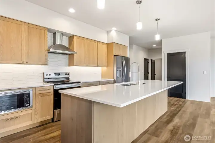 Large island with space for dining and food prep.