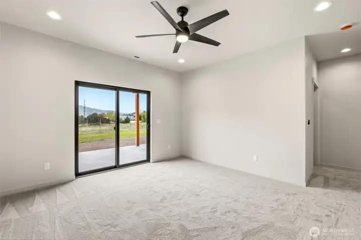 Primary suite complete with walk-in closet and en-suite bathrrom.