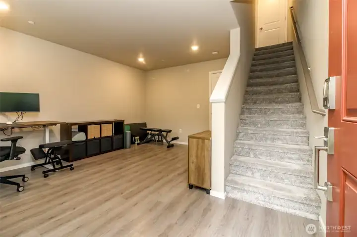Entry/garage level to den/bonus room