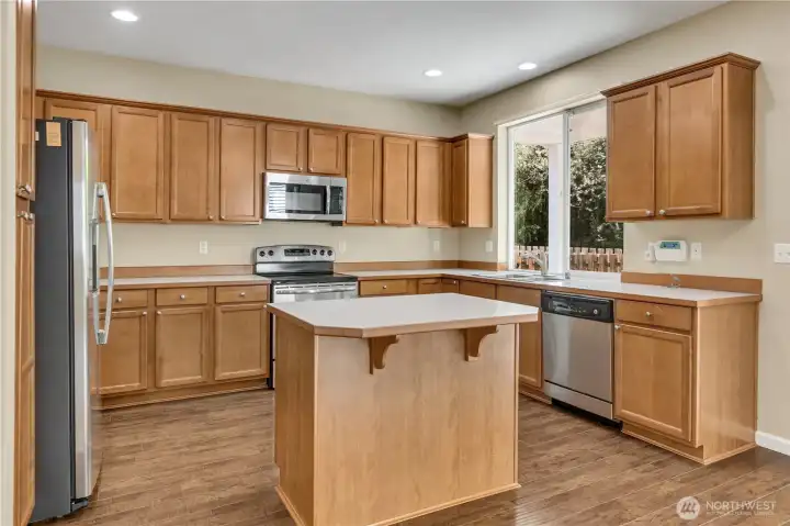 This kitchen has room for everything and everyone! This kitchen layout is suitable for those that like to cook and keep things out of sight. So much prep space and elbow room. This kitchen has room for everything and everyone! This kitchen layout is suitable for those that like to cook and keep things out of sight. So much prep space and elbow room.