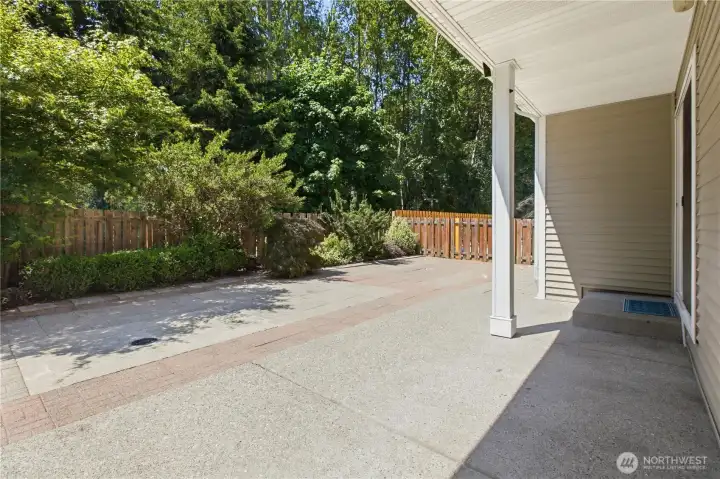Covered back patio and low maintenance yard. Lovely greenspace to spend quality time in. Covered back patio and low maintenance yard. Lovely greenspace to spend quality time in.