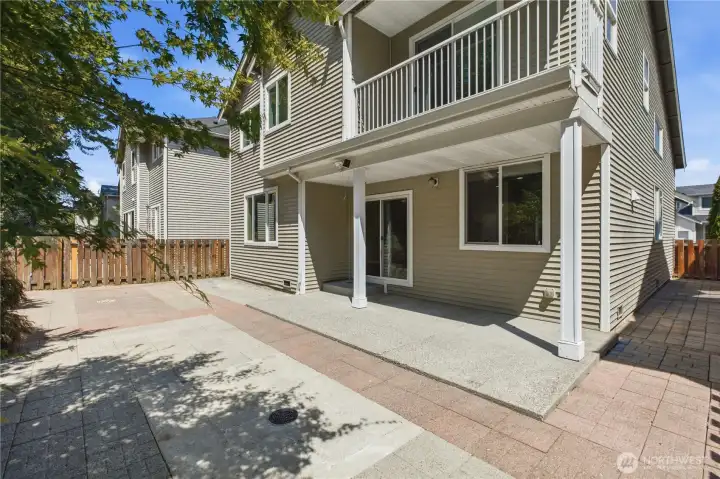 Concrete pavers also line the side walkway. Concrete pavers also line the side walkway.